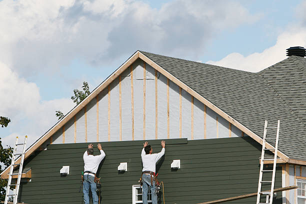Professional Siding Contractor technician working in East Rockaway, NY